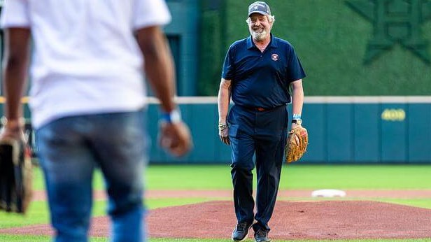 Dr. Lewis on the mound at the